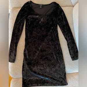 A beautiful velvet body con dress! Fits true to size